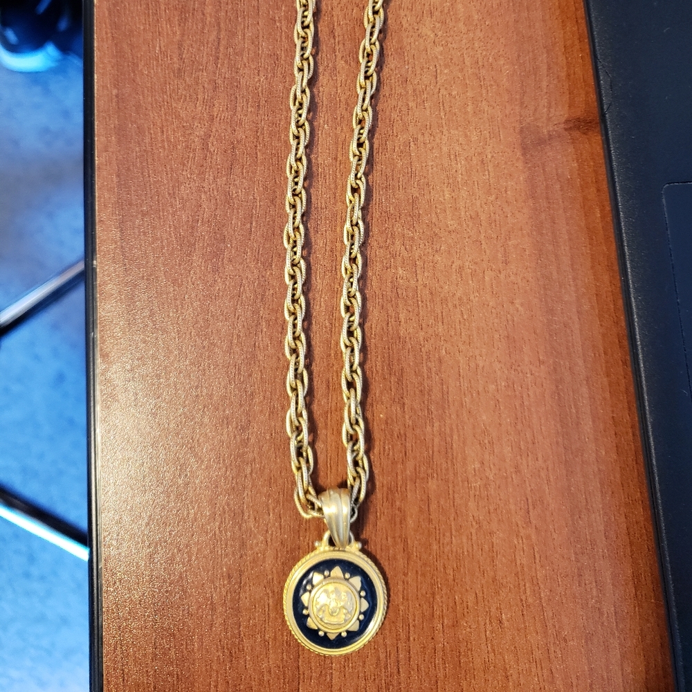 Gold colored pendant necklace